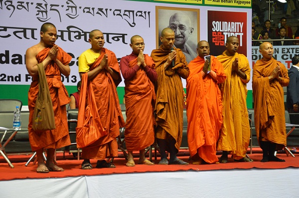 Monks from various buddhist countries reciting prayers.
